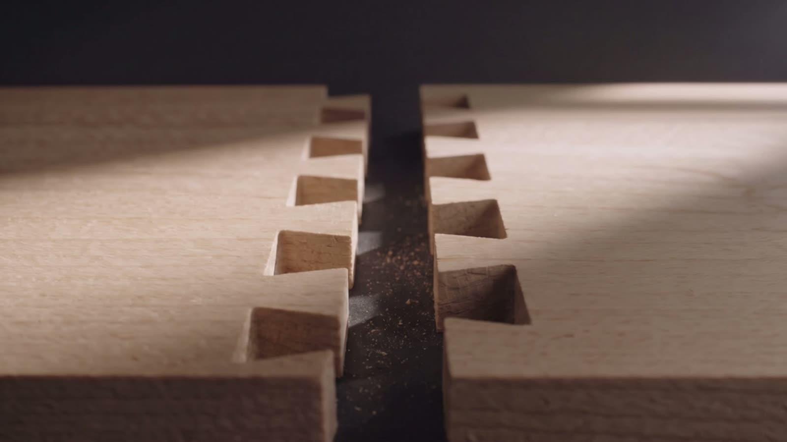 Close-up of a dovetail joint cut in pale timber